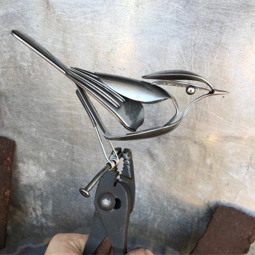 Скульптуры птиц из старых вилок и ложек