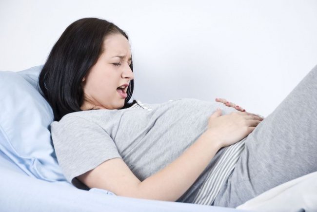 Почему во время беременности болит живот?