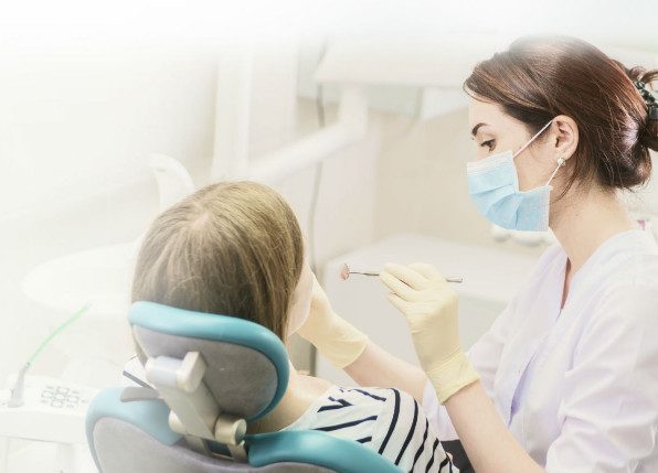 Как лечить зубы во время беременности
