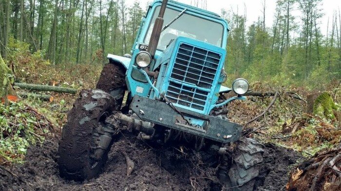 Вопрос на засыпку: почему у трактора задние колёса намного больше передних?